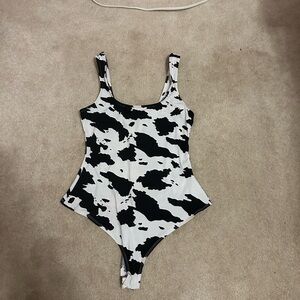 Cow Print One-Piece Bodysuit